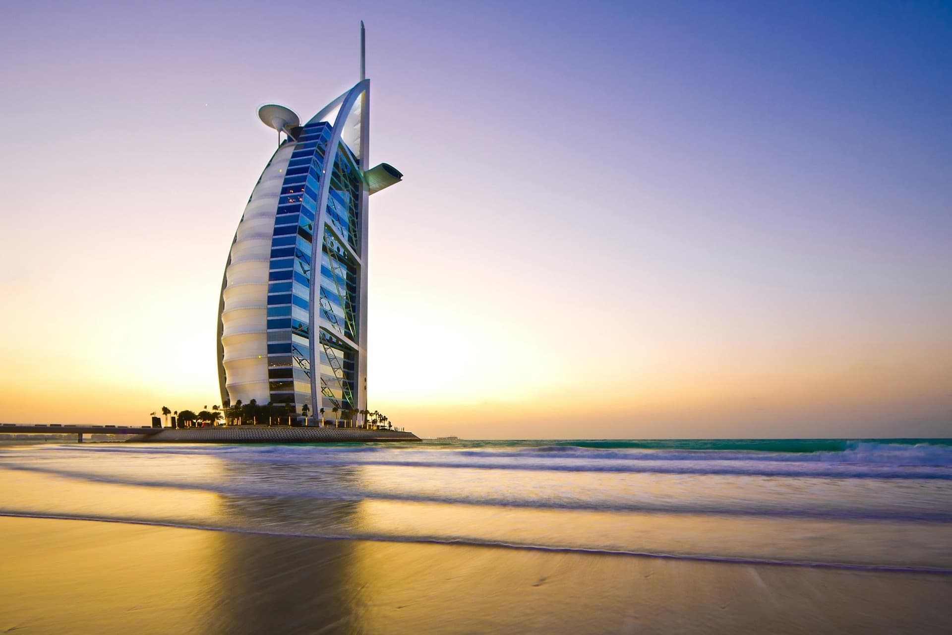 Burj Al Arab on the Dubai beach at sunset